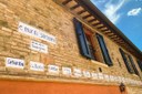 Rimini, Borgo San Giuliano: “Il Muro dei Soprannomi”, opera di Tonino Guerra - foto VisitRimini